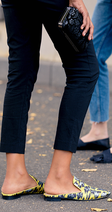 pink-purple loafers and shiny black decorated derbys