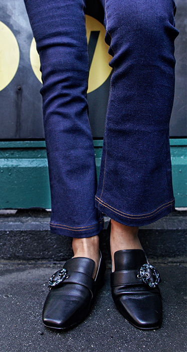 Helen Chik in black loafers