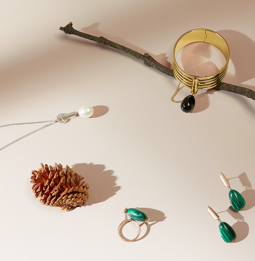 Jewellery designed in melbourne featuring layered metal, malachite and natural stones
